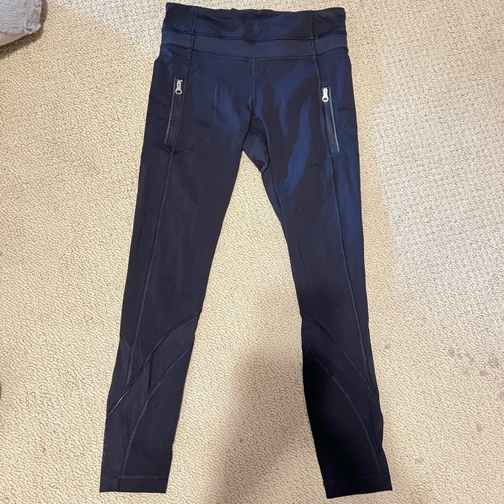 Lululemon Black Inspire Tight Leggings Size 4 Pockets and Mesh 25” inch